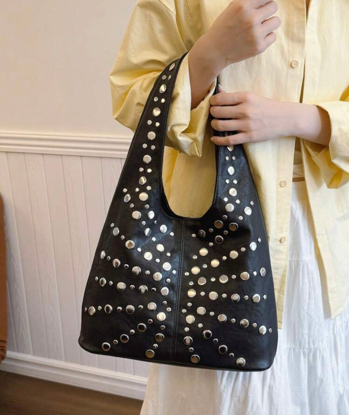 Studded black leather bag